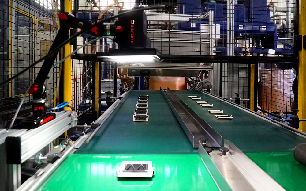 Vision sensor with built-in lighting for better clarity inspecting products on a conveyor